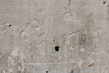 Chipped concrete wall closei[