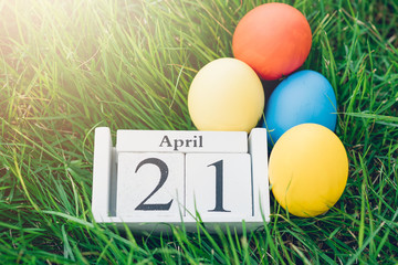 Easter egg on garden grass background,