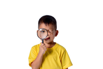 Happy kid exploring with magnifying glass isolated on white background