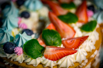 Light and fresh cake. Refined dessert made from meringue topped with low-fat whipped cream, mint...