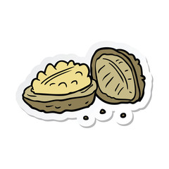 sticker of a cartoon walnuts