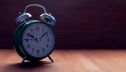 classic green alarm clock night slip time