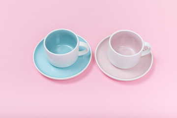 Clean dishes, coffee or tea set on pink background