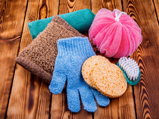 Objects for care of face skin: handmade natural soap, a sponge, the peeling brush and a massage...