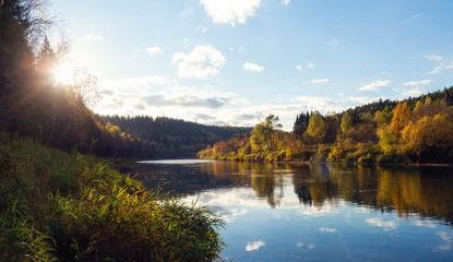 Fototapeta na wymiar sunset autumn in river