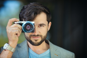 Male photographer taking picture