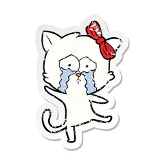 distressed sticker of a cartoon cat