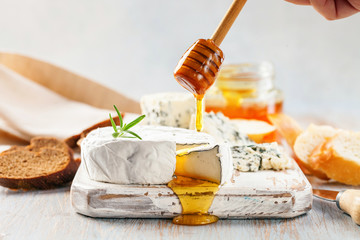 Cheese Brie Noir with honey