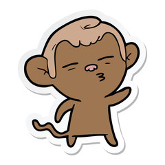 sticker of a cartoon suspicious monkey