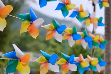 Fototapeta na wymiar Many of colorful pinwheel for outdoor decoration