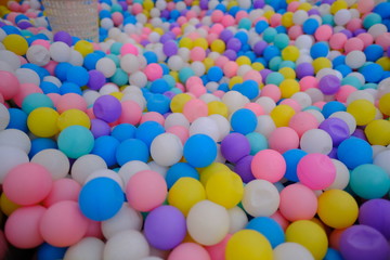 Fototapeta na wymiar Colorful kids ball pit or ball pool playground for children 