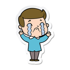 sticker of a cartoon man crying
