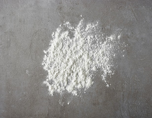 white flour on grey kitchen table