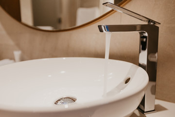 Bathroom interior with sink and faucet