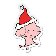 cute sticker cartoon of a elephant dancing wearing santa hat
