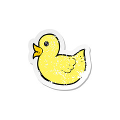 retro distressed sticker of a cartoon rubber duck