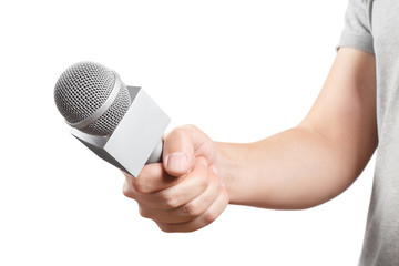 Hand of the news reporter holding a microphone, isolated on white background
