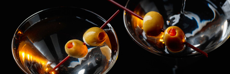 Martini with green olives .