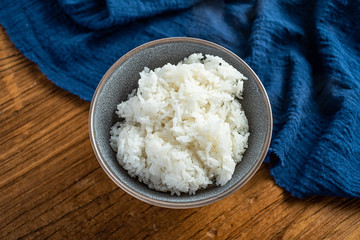 a bowl of white rice on the table