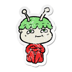 distressed sticker of a friendly cartoon spaceman