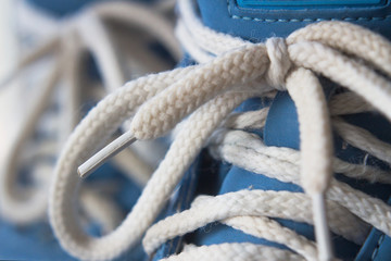 Knotted laces on boots Copy space