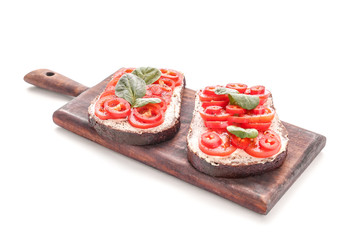 Fresh tasty bruschettas on white background