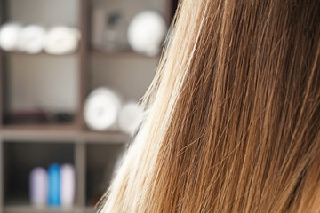 Healthy long hair of young woman