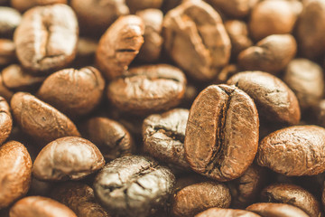 Roasted coffee beans closeup background
