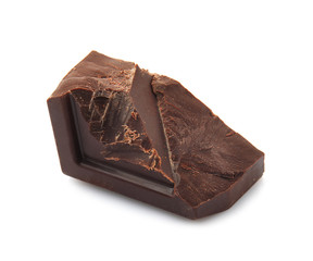 Piece of tasty dark chocolate on white background