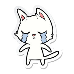 sticker of a crying cartoon cat
