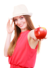 Woman summer hat colorful makeup holds apple fruit