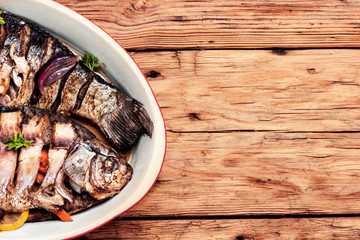 Carp stuffed with vegetables