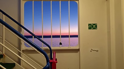 Irish ferry leaving Cherbourgh in France to Dublin harbour during sunset - Ireland