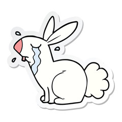 sticker of a cartoon bunny rabbit crying