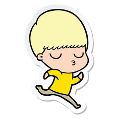 sticker of a cartoon calm boy