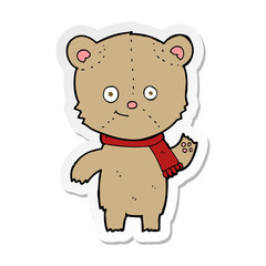sticker of a cartoon teddy bear waving