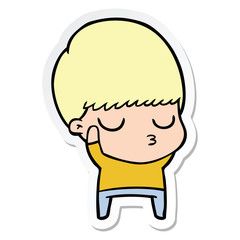 sticker of a cartoon calm boy