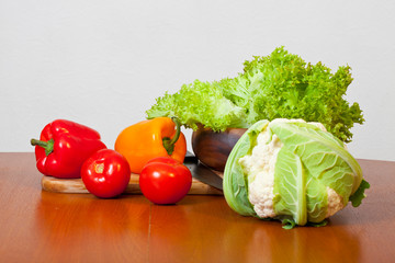 Women's hands are preparing a salad