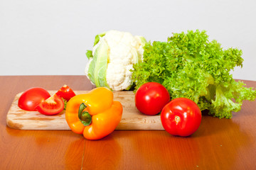Women's hands are preparing a salad