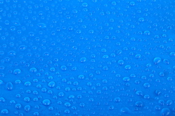 Naklejka na ściany i meble Drops on blue background