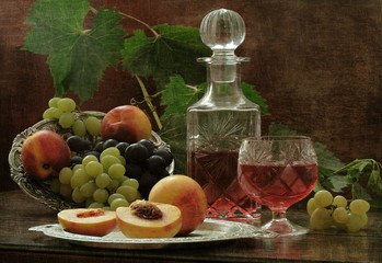 Wine with fruits on the wooden table