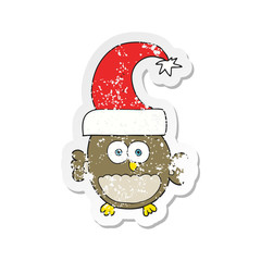 retro distressed sticker of a cartoon little christmas owl