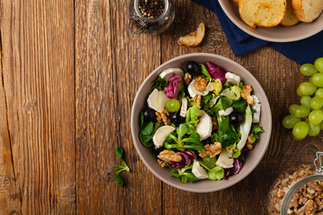 Italian spring salad with goat cheese, grapes and walnuts. Served with croutons.