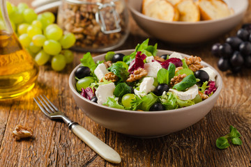 Italian spring salad with goat cheese, grapes and walnuts. Served with croutons.