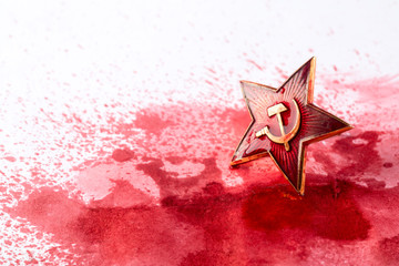 Soviet red star badge in blood