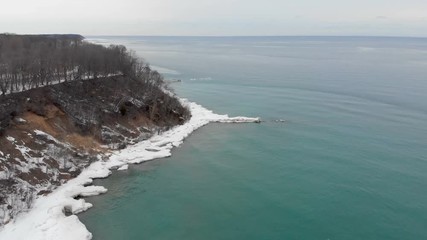 Michigan lake in Winter. Water, cold weather, bird's eye view, drone shots