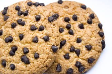 Round cookie with chocolate isolated over the white background