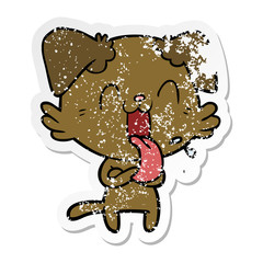 distressed sticker of a cartoon panting dog
