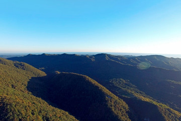 Fototapeta premium Aerial view of the mountain landscape in the daytime. Abkhazia.