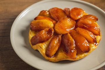Homemade apple Tarte Tatin on a plate.